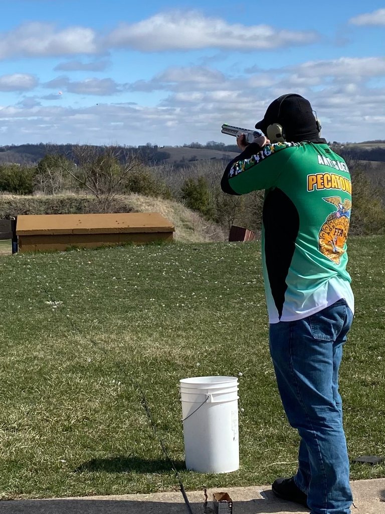 Image of a student at trap team practice.